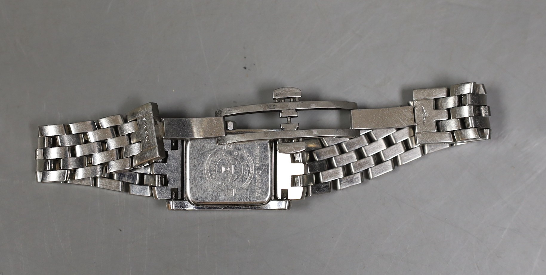 A lady's modern stainless steel Longines rectangular dial quartz wrist watch, with box and papers, case diameter 21mm.